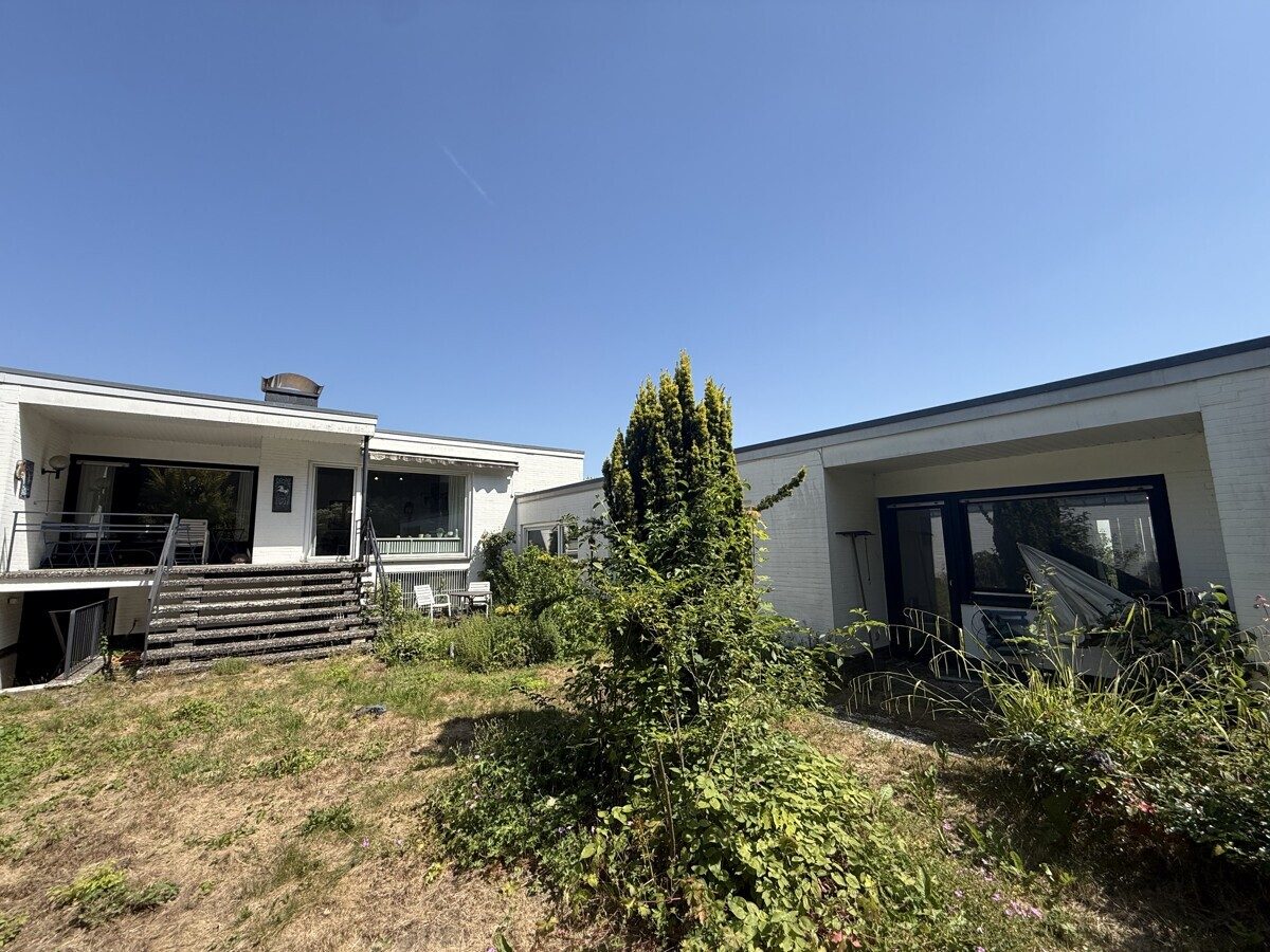 VMI Vermittlung Münster Immobilien GmbH & Co. KG - Immobilienangebot - Münster - Alle - Wohnen im Grünen: Split-Level-Bungalow auf Erbbaugrundstück mit Erwerbsperspektive!